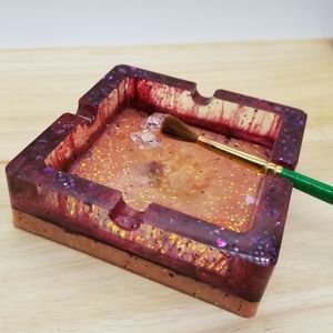 NWOT handcrafted pink/plum resin ash/trinket tray.